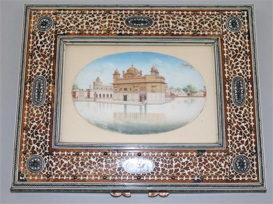 An early 20th century Indian ivory miniature of The Golden Temple, 3 x 4.75in. in ivory overlaid tortoiseshell frame 7 x 8.5in.